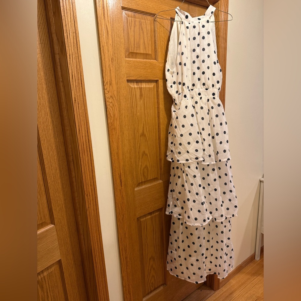 White tiered dress with black polka dots